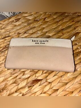 Beautiful kate spade two-tone blush and cream continental wallet.